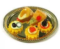 "Miniature! Witch's Afternoon Tea Mascot" is a set of pie, Canape and gold plates.