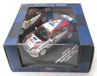 1/43 FORD FOCUS WRC "MARTINI" RALLY DE MONTE CARLO 1999 Valvoline #7 (Branco, Vermelho e Azul) [SKM99019]