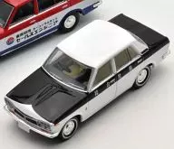 1/64 LV-79c Datsun Bluebird 1400 dx General security services (Black x White) "Tomica Limited Vintage" [255987]