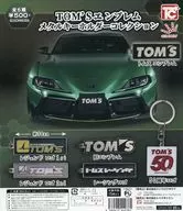 ガチャ台紙 「TOM’Sエンブレム メタルキーホルダーコレクション」