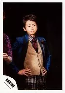 Arashi / Satoshi Ohno / Upper Body / Costume Blue / Brown Vest / Both Hands Waist / Eye View Right / Background Black / Official Official photo