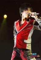 7 WEST / Tomohiro Kamiyama / Live photo, above the knees, costume red and black silver, left hand microphone, right eye view, logo "Kansai Johnny'sJr." / Official Official photo