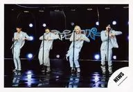 NEWS / Gather (4 people) / Whole body, costume white, silver, both hands thumb little finger standing. Breast, microphone stand, stage, black background, back "チャンカパーナ" / Official Official photo