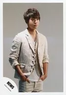 NEWS / Keiichiro Koyama / Above-the-knee ・ Costume white ・ Right facing ・ Both hand pockets ・ Mouth closed ・ Background grey / "ヒカリノシズク / Touch" Jacque shooting / Official Official photo