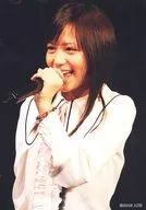 Tomomi Kasai / Live Photo / Upper Body / Costume White / Left Hand Microphone / Left Facing / Open Mouth / "2006 AKS" / Official Official photo