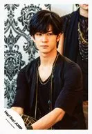 Hey! Say! JUMP / Hiroto Nakajima / Upper body, sitting, costume black, necklace, eyes right, mouth closed, members behind / 16 Summer Concert, Brochure and Goods Shooting / Official Official photo