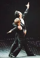Tokio / Tatsuya Yamaguchi / Live Photo, Whole Body, Costume black and white, Right Hand Par, Spread Legs, Lower Left Eye, Behind Matsuoka, No Frame / Official Official photo