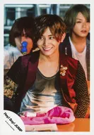 Hey! Say! JUMP / Ryosuke Yamada / Upper body / Costume red / black / grey / Eye point left / Showing teeth / Tail and Takagi Ino behind / "Fantastic Time" PV & Jacque photo / Official Official photo