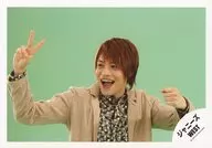 Johnny's West / Junta Chugen / Horizontal ・ Bust up ・ Costume Beige ・ Black ・ Right Hand Piece ・ Left Hand Fist ・ Mouth Opening ・ Green Background / "ZIPANG Okini Taisaku" PV Off-shot / Official Official photo