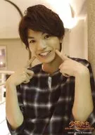 SixTONES / Yugo Kochi / Bust up. Costume blue. black. white, both hands forefinger cheek / "Boys, dream of the world. children who don't know war" original photo