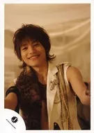 B. A. D. / Middle Junta / Top, Clothes Black & Black Gold, Front of Hands, Smile, Background Beige / Official photo oficial