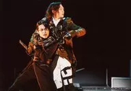 Shin' ichi Hashimoto (Makoto Kogure), James' Take Yamada (Salyto) / Live Photo, Horizontal, Above the Knee, Costume Black, White, Khaki, Eye View Right, Background Black, Character Tomoshot / Stage "Messiah - Akatsuki no Toki -" Genepro Photo Set C