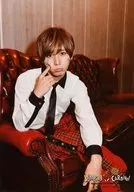 Hey! Say! JUMP / Ryosuke Yamada / knee-up / sitting / costume black and white / red / check / right forefinger cheek / "Hey! Say! JUMP COUNTDOWN LIVE 2015-2016 JUMPING Carnival Count Down" original photo