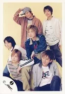 Johnnys Jr. / Gather (6 people) / Tanaka right hand hat. Check pattern costume red, red west costume blue denim, left eye view, KAT-TUN, background yellow / Official Official photo