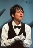 Ryo Hirano / Live Photo / Upper Body / Costume Black / White / Bow Tie / Facing Right / Matching Both Hands / Opening Mouth / "CASE CLOSED x Live Mystery : Labyrinth on the Sea" Bromide