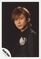 KinKi Kids / Koichi Domoto / Bust up ・ Costume black and white dot pattern ・ Body facing left ・ Eye view right ・ Background black / Official Official photo