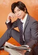 Yusuke Kashiwagi / Knee-Up, Sitting, Costume Gray, Suit, Left Facing, Right Cheek, Left Hand Newspaper, Background Orange / Stage "Nouvell Vague" Bromide