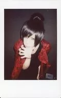 The Raid. / Tenshi / Upper Body / Costume Red / Black / Right Hand / Chin / Bending Forward / Background Grey / Raw Cheki