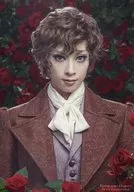 Takarazuka Revue (Hanagumi) / Rio Asukai / Bust-up ・ Background brown / Hanagumi's performance "Po-no Ichizoku" still picture