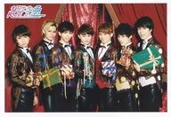 Super Express / Group (7 people) / Horizontal / Above the knees / With a gift box in one hand / Background stage curtain / Red / "CHRISTMAS ONEMAN LIVE FANTASY LOVE TRAIN ～ A rail that connects to your home ～" Official photo 12th edition