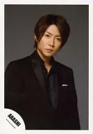 Arashi / Masaki Aiba / Upper Body / Costume Black / Body Obliquely Facing Right / Eye View Right / Background Grey / Official Official photo