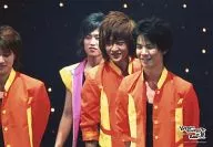 Kansai Johnnys Jr. / Gather (4 people) / Live Photo / Horizontal / Upper body / Costume / Orange / Yellow / Facing left / Under eyes / Background black / Kansai Johnnys Jr. 2007 Summer @ Osaka Shochikuza