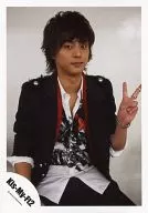 Kis-My-Ft2 / Taisuke Fujigaya / Upper body, sitting, costume black, red, shirt white, left hand piece / Official Official photo