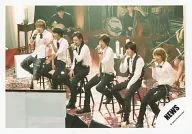 NEWS / Gather (6 people) / Live photo, horizontal, whole body, sitting, costume black and white, microphone / Official Official photo