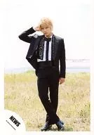 NEWS / Yuya Tegoshi / Whole body / Costume black / Shirt white / Right hand head / Crossing legs / Outdoor / Official Official photo