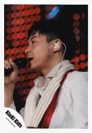KinKi Kids / Domoto Go / Live Photo / Bust Up / Costume White / Red / Left Facing / Right Hand Microphone / Open Mouth / Eye Left / Background Black / Red / Official Official photo