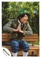 Kanjani Eight / Tadayoshi Okura / Knee-Up, Sitting, Costume Khaki. Green. Blue, Cap, Necker Chief, Matching Both Hands, Opening Mouth, Looking Right, Background Tree / Official Official photo