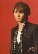 KinKi Kids / Koichi Domoto / Upper body / Costume black / white / Background red / "Endless SHOCK 15th Anniversary" original photo