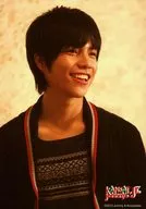 7 WEST / Daiki Shigeoka / Bust up / Costume black / Face right facing / Mouth opening / Background beige / Kansai Johnny's Jr. X' mas Concert 2012 in Shochikuza