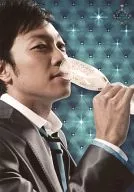 Takuma Otoo / Upper body / Body facing sideways / Costume grey / white / Right hand glass / Glass mouth / Background light blue /' ThankCUE FANMEETING 2011' official Official photo