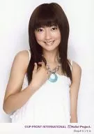 Berryz Kobo / Yurina Kumai / Upper-body / White Costume / Necklace Blue / Right Hand Breast / Teeth Showing / Background White / Shop Original