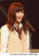 Berryz Kobo / Yurina Kumai / Upper Body / Uniform / Costume White Shirt / Vest Beige / Tie Red / Body Facing Right / Mouth Opening / Stand Microphone / Background Black / Official Official photo