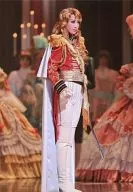 Takarazuka Revue : Masaki Ryu (Oscar) ; full body and costume : red platinum ; sword on the left ; body facing the right ; moon group :' The Rose of Versailles' (edited by Oscar and Andre) ; official Official photo of' Takarazuka Revue'