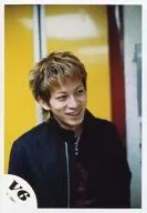 V6 / Jun' ichi Okada / Bust up / Costume black / Eye view right / Background yellow / Official Official photo