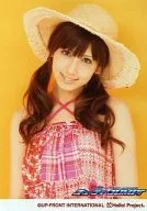 ° C-ute / Erika Umeda / Upper Body / Costume Check Pattern. Pink / Hat / Background Orange / ° C-ute Concert Tour 2009 Summer and Autumn Cute Jump! / Official Official photo