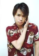 Tomohiro Hara / Bust up / Shirt red / Right hand ear / Camera eye / Background white / Official Official photo