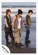 KAT-TUN / Ueda, Tanaka, Nakamaru / Whole Body, Costume Khaki, Brown, Pants Black, Green, Jeans, Body Facing Right, Knitted hat, Background Seaside / Official Official photo