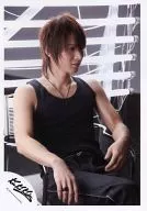 Kinki Kids / Koichi Domoto / Knee-Up / Sitting / Tank Top Black / Eye Right / Light White / Background Grey, Fluorescent Light / Official Official photo
