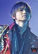 KinKi Kids / Koichi Domoto / Live photo, bust up, costume red gold and silver black, background blue, no frame, logo "KinKi you" / Kinki Kids Emergency Nationwide Tour KinKi you Concert.