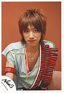 NEWS / Keiichiro Koyama / Above the waist / Costume light blue red check / Background orange / Official Official photo