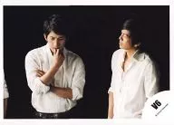 V6 : Junichi Okada, Tsuyoshi Morita / Horizontal, Upper Body, Shirt White, Background Black, Right Hand Okada Face, Left Eye / Official Official photo