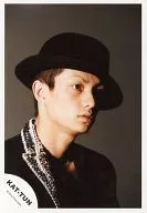 KAT-TUN / Sei Tanaka / Bust up / Costume black / Cap / Eye right upper / Background brown / Official Official photo