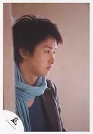 Arashi / Satoshi Ohno / Bust up / Costume black / Stole light blue / Column in front / Beige background / Official Official photo