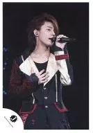 Kis-My-Ft2 / Taisuke Fujigaya / Live Photo / Upper Body / Costume Black Gold / Left Hand Microphone / Right Hand Chest / Background black / Official Official photo