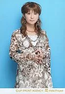 Mari Yaguchi / Above the Knee / Brown Costume / fingers of both hands Matching / Light Blue Background / Earrings / Necklace / Official Official photo