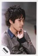 Arashi / Kazuya Ninomiya / Bust up / Shirt Grey / Left Hand Around Mouth / Eye View Right / Background Grey / Official Official photo